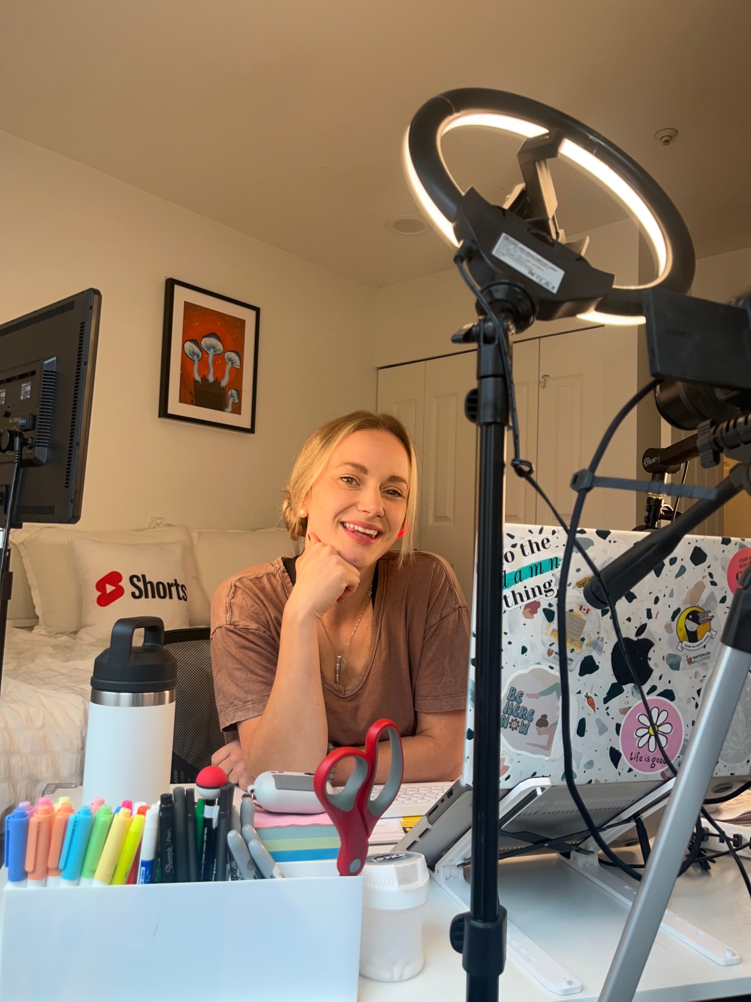 Danielle filming content at her home studio setup